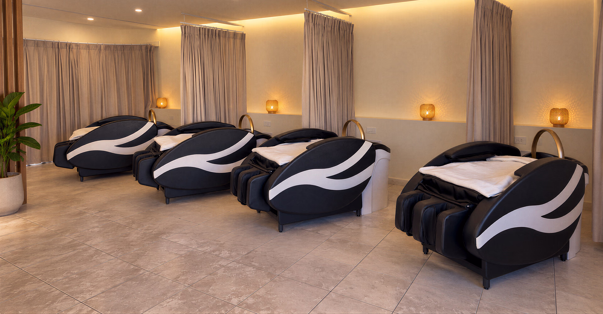 Four head spa stations with reclining chairs and shampoo basins.